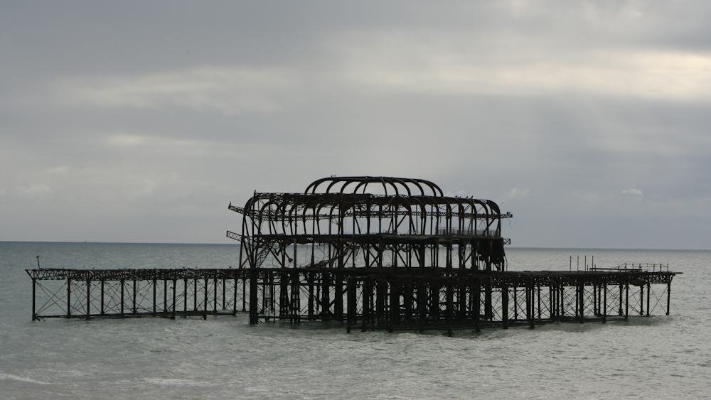 Brighton Pier extending into the sea, a popular coastal day trip from London