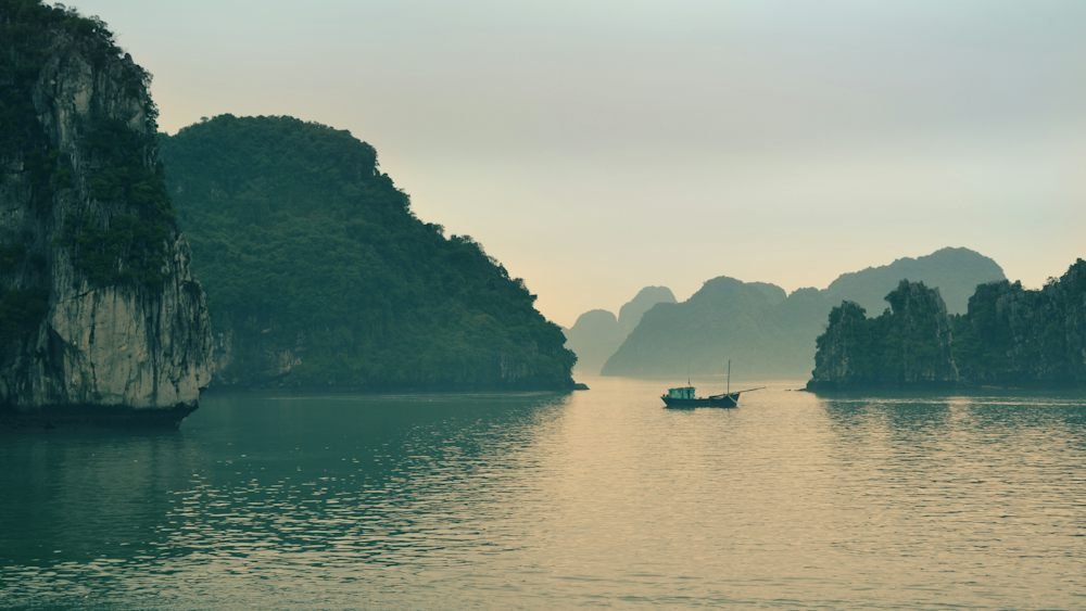 Boat on the water in Ha Long Bay, Vietnam, a budget-friendly destination to visit in June