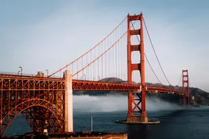 Golden Gate Bridge enveloped in morning fog in San Francisco